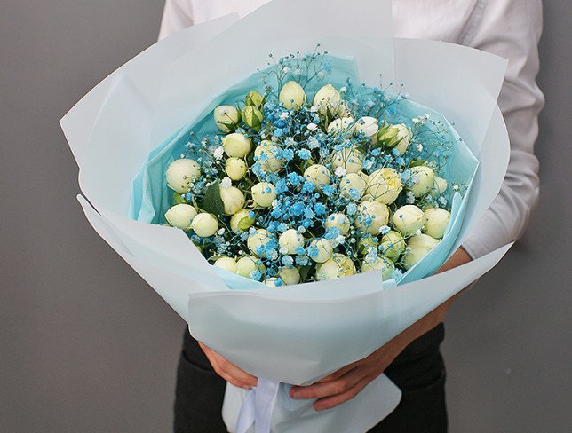 Bouquet of green peony roses and gypsophila photo