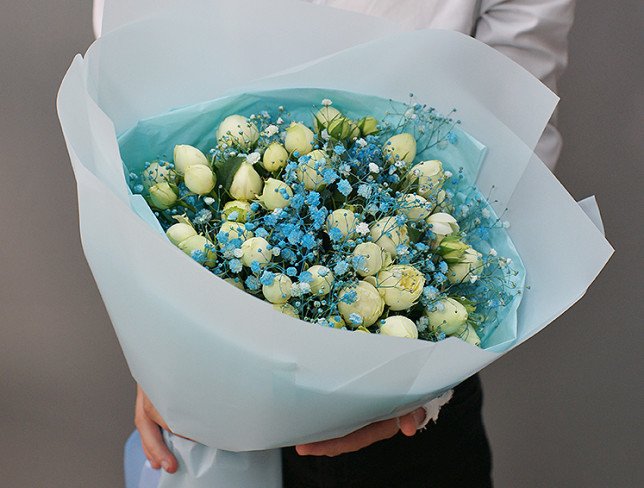 Bouquet of green peony roses and gypsophila photo