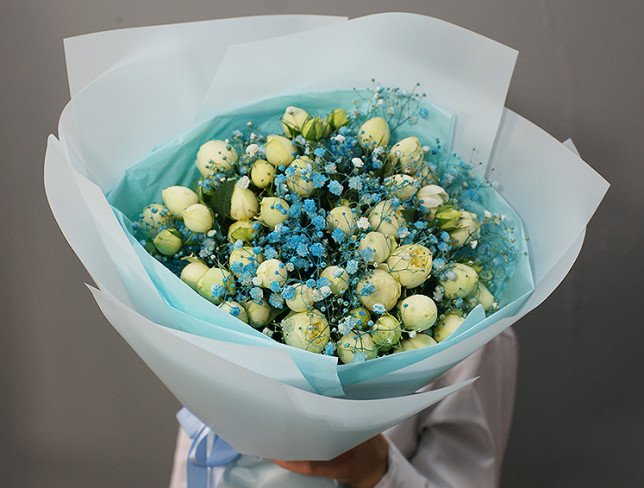 Bouquet of green peony roses and gypsophila photo