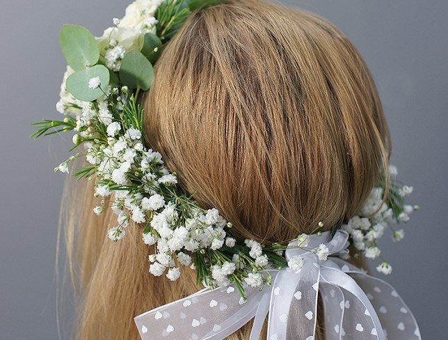 Wreath of white spray roses and gypsophila photo