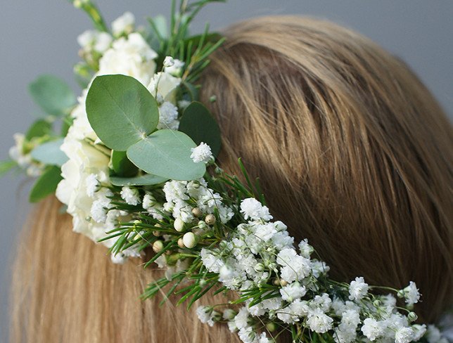 Wreath of white spray roses and gypsophila photo