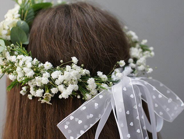 Wreath of white spray roses and gypsophila photo