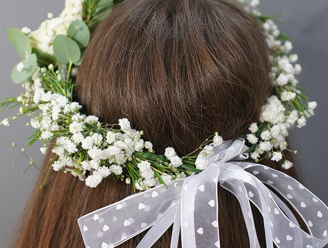 Wreath of white spray roses and gypsophila photo