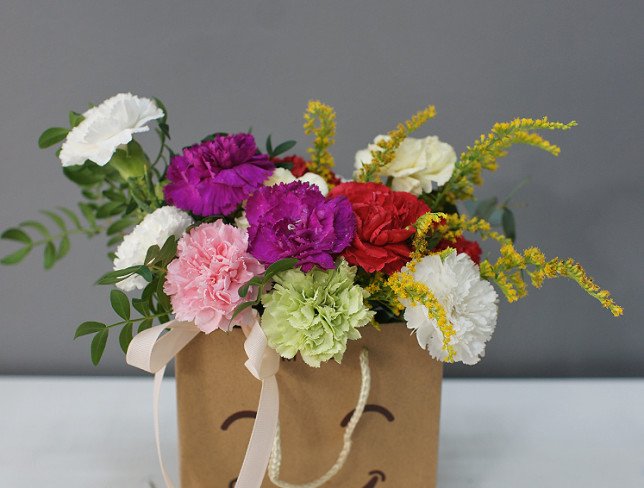 Handbag with multi-colored carnations photo