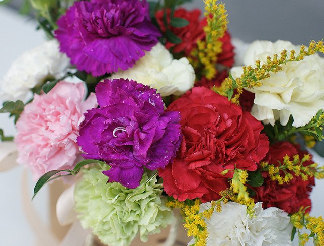 Handbag with multi-colored carnations photo