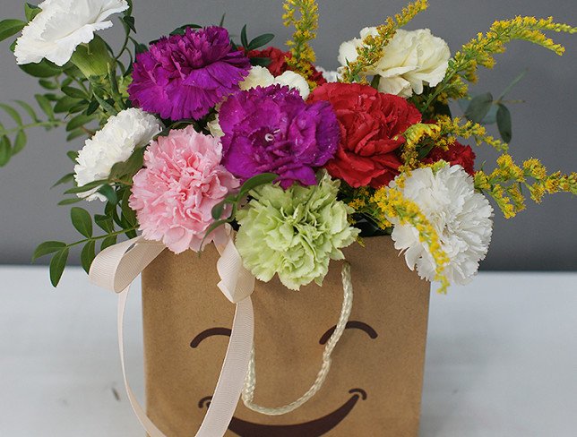 Handbag with multi-colored carnations photo