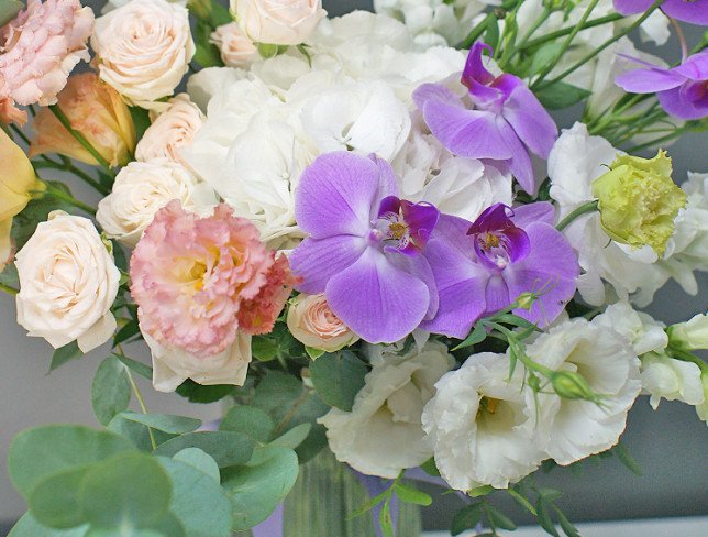 Vase + Bouquet with white hydrangea and eustoma photo