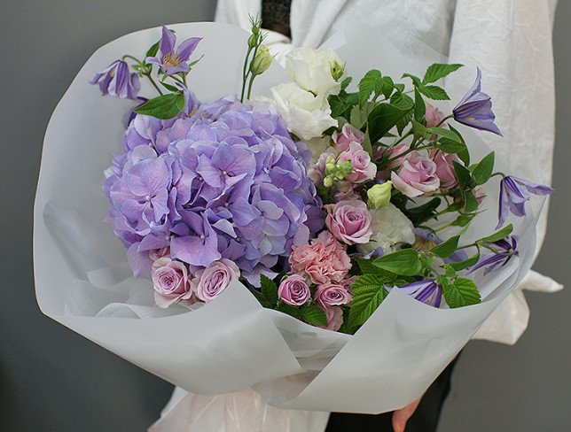 Bouquet of purple hydrangea and clematis photo