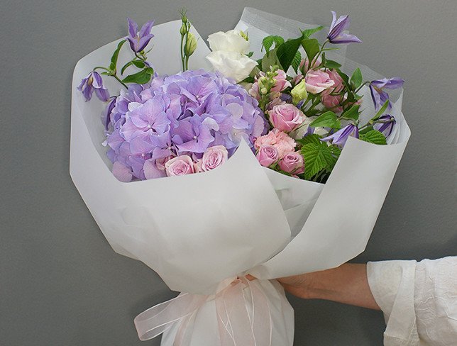 Bouquet of purple hydrangea and clematis photo