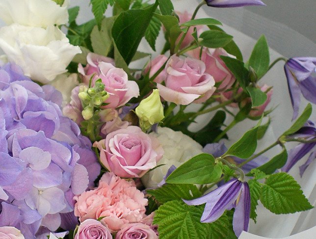 Bouquet of purple hydrangea and clematis photo