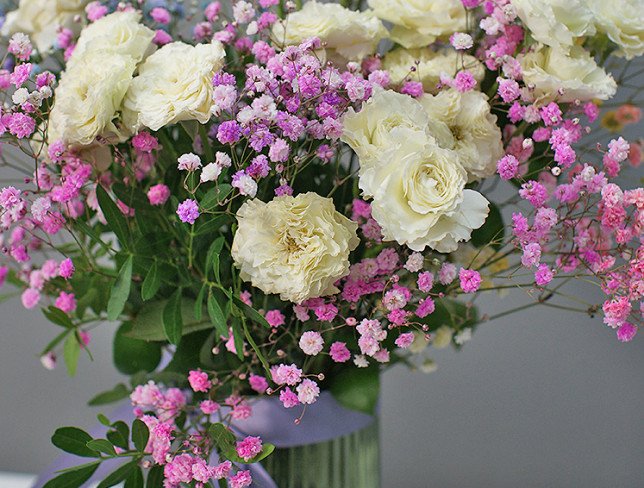 Vase + Bouquet of spray roses and gypsophila photo