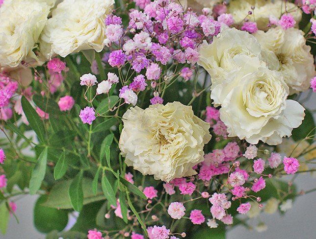 Vase + Bouquet of spray roses and gypsophila photo