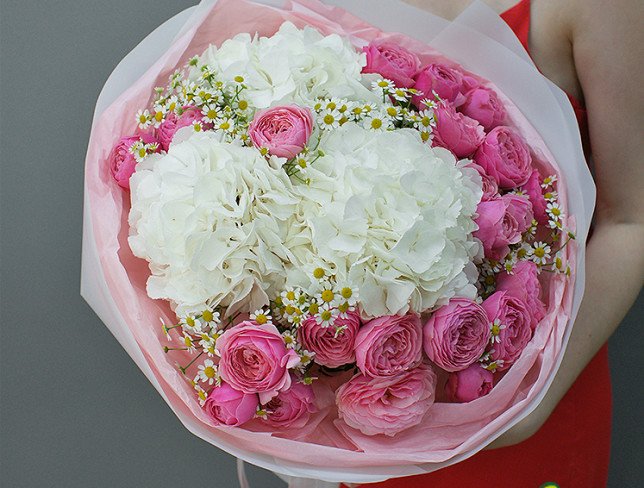 Bouquet of white hydrangeas and Silvia Pink roses photo