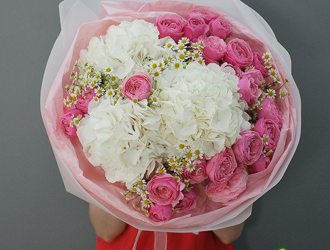 Bouquet of white hydrangeas and Silvia Pink roses photo