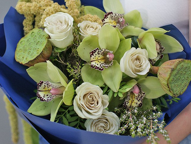 Bouquet of green roses and orchids photo