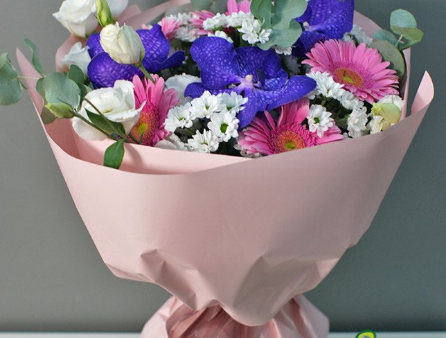 Bouquet of pink gerberas and vanda orchids photo