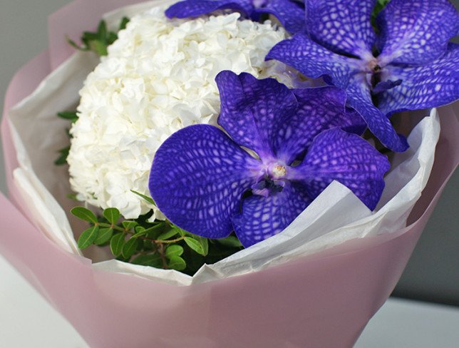 Bouquet of white hydrangea and vanda orchids photo