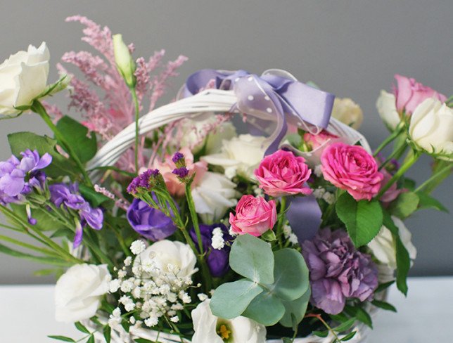 Basket of roses and eustoma photo