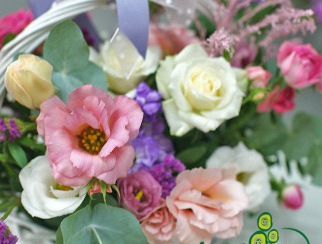 Basket of roses and eustoma photo