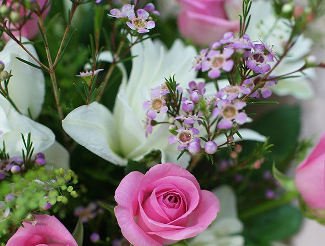 Bouquet of pink roses and white lilies photo