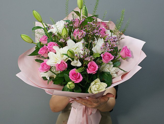 Bouquet of pink roses and white lilies photo