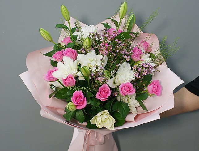 Bouquet of pink roses and white lilies photo