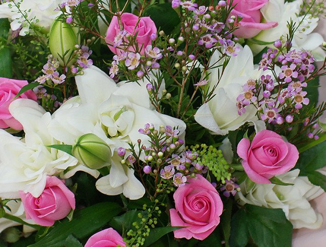 Bouquet of pink roses and white lilies photo