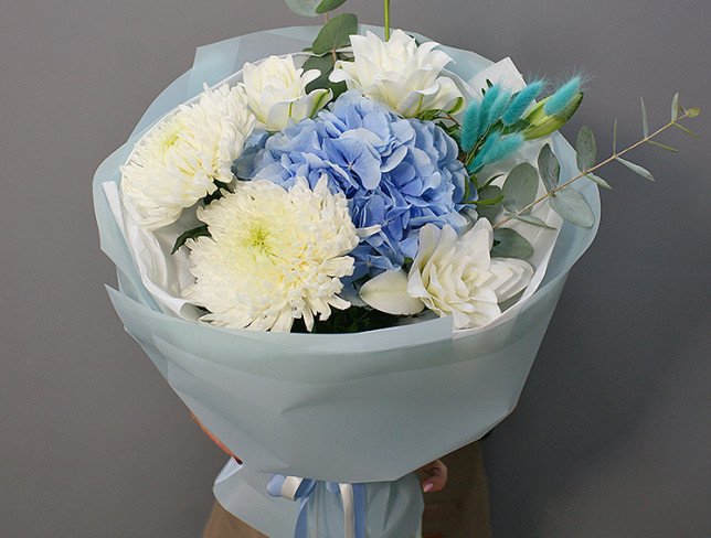 Bouquet with blue hydrangea and white lilies photo