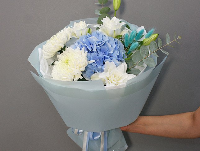 Bouquet with blue hydrangea and white lilies photo