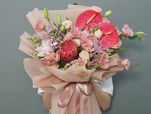 Bouquet of pink eustoma, anthurium and protea "Charm of Exotic" photo