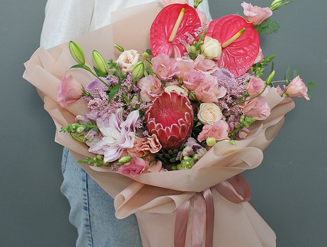 Bouquet of pink eustoma, anthurium and protea "Charm of Exotic" photo