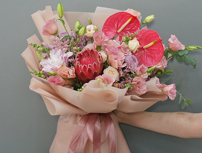 Bouquet of pink eustoma, anthurium and protea "Charm of Exotic" photo