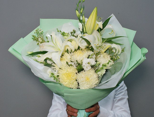 Bouquet of white eustoma, asters and lilies photo