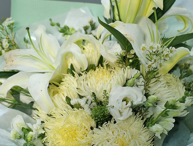 Bouquet of white eustoma, asters and lilies photo