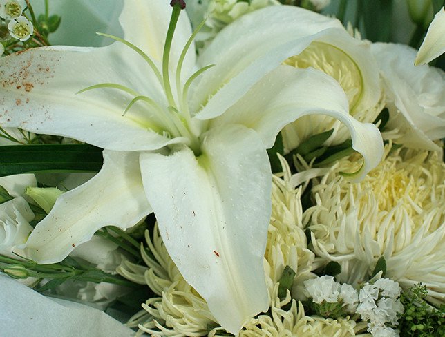 Bouquet of white eustoma, asters and lilies photo