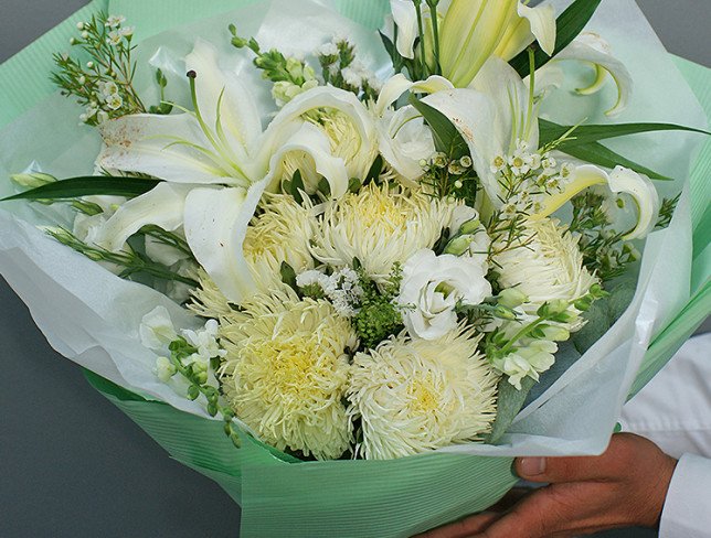 Bouquet of white eustoma, asters and lilies photo