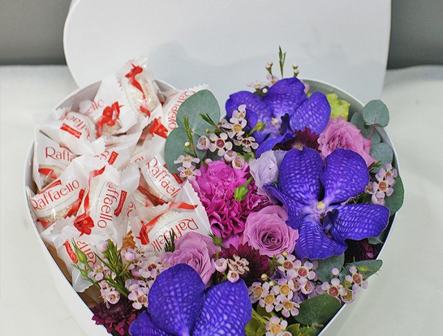 Box with Vanda orchid and Raffaello candies photo