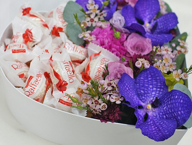 Box with Vanda orchid and Raffaello candies photo