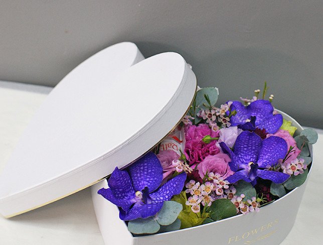 Box with Vanda orchid and Raffaello candies photo