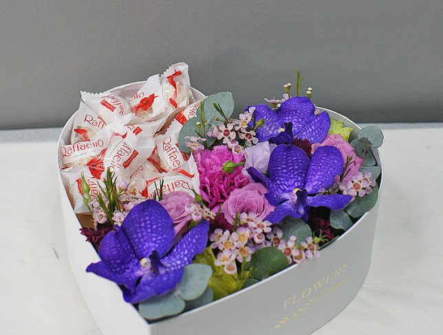 Box with Vanda orchid and Raffaello candies photo