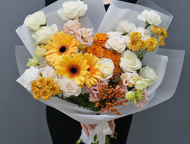 Bouquet of orange gerberas and dahlias photo