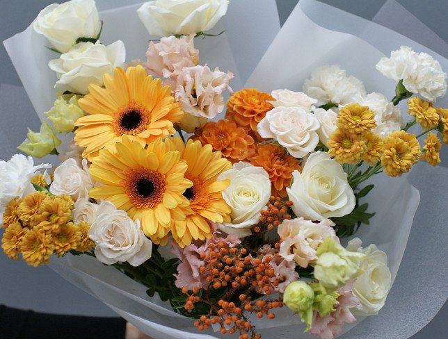 Bouquet of orange gerberas and dahlias photo