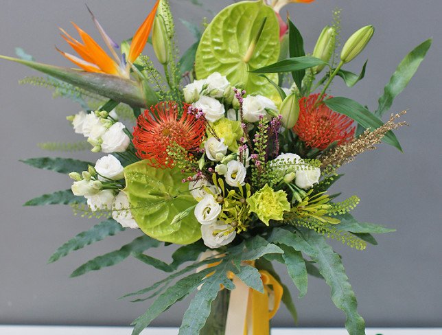 Vase + Bouquet of green anthurium and strelitzia photo