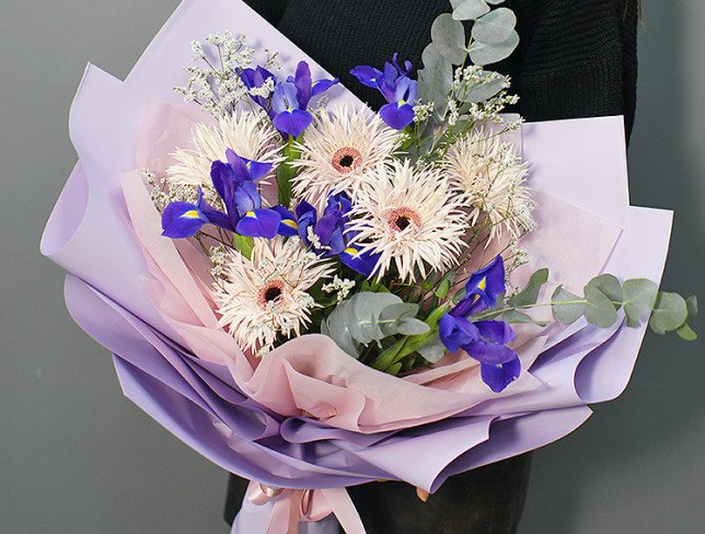 Bouquet of purple irises and gerberas photo