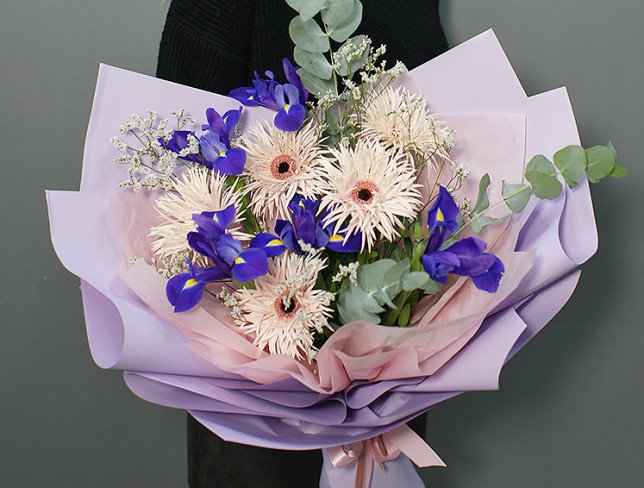 Bouquet of purple irises and gerberas photo