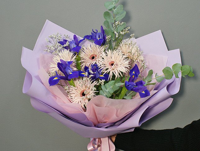 Bouquet of purple irises and gerberas photo