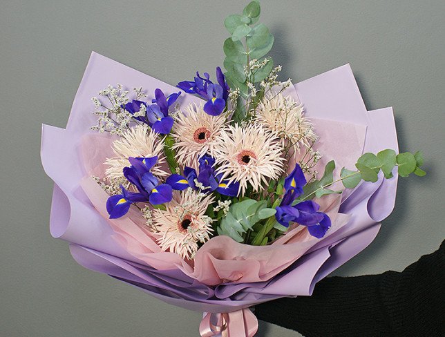 Bouquet of purple irises and gerberas photo