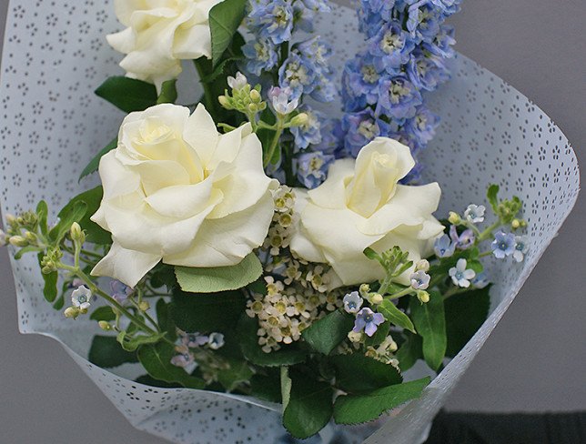 Bouquet of white roses and delphinium photo