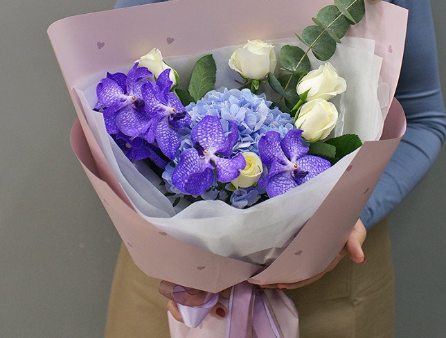 Bouquet with blue hydrangea and vanda orchid photo