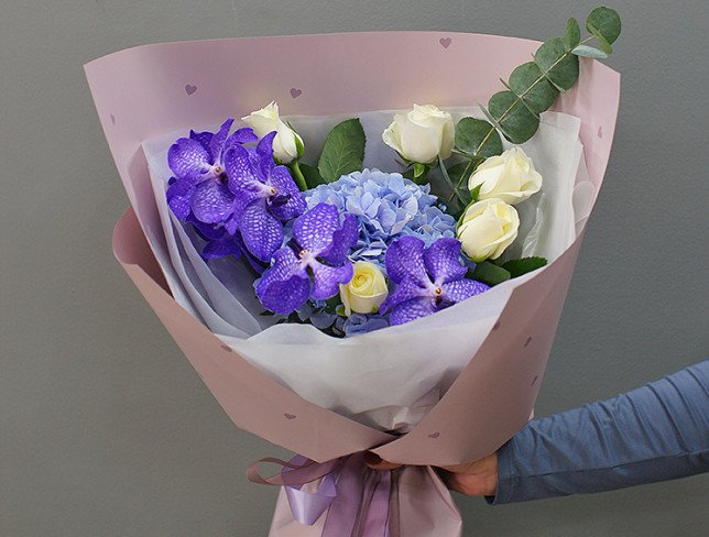 Bouquet with blue hydrangea and vanda orchid photo